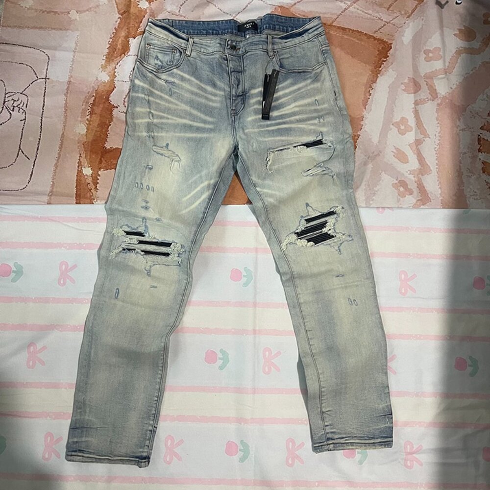 AMIRI Distressed Leather Patch Skinny Jeans